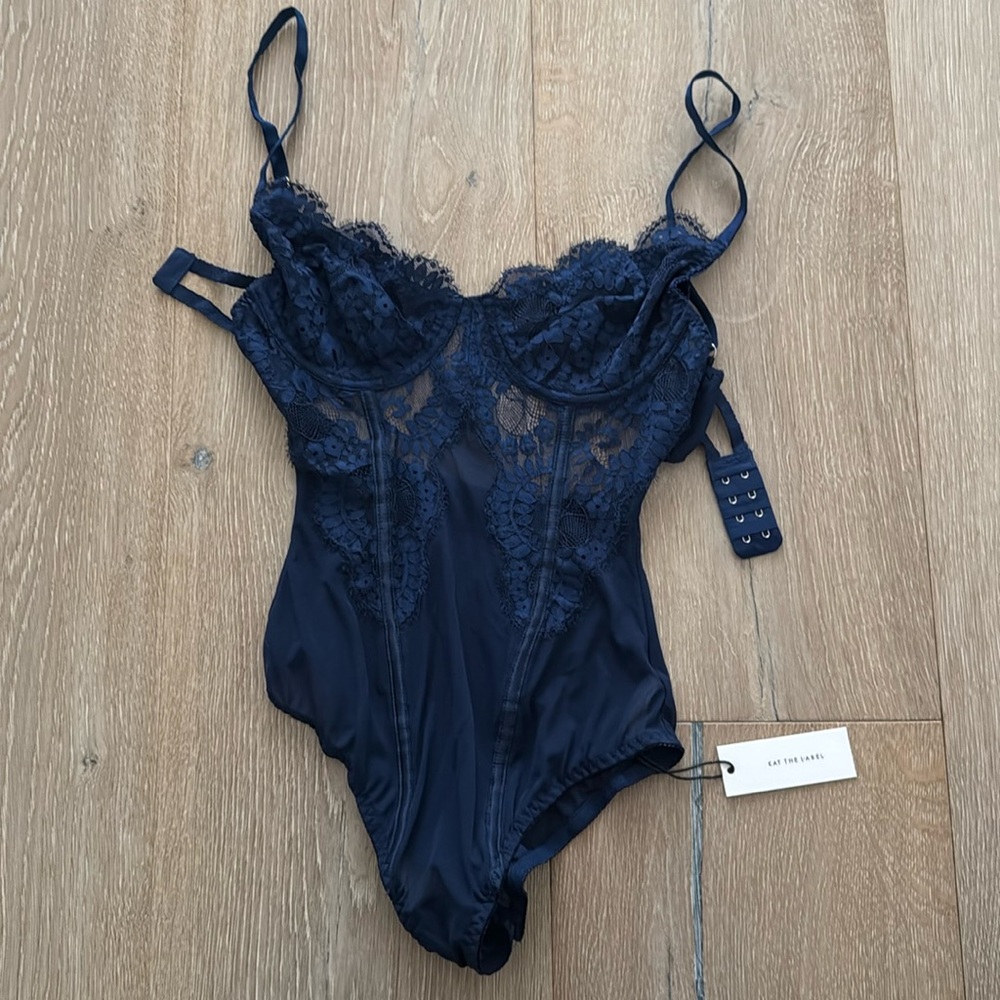 Never worn with tags bodysuit